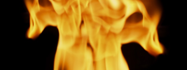 Fire background. abstract burning flame and black background.\
represents the power of burning refers to heat spicy seductive\
sensual or burning fuels. fire incidents burning destroys\
everything.