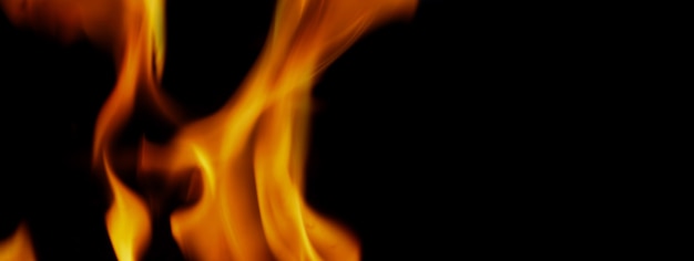 Фон огня. Абстрактное горящее пламя и черный фон. представляет силу горения относится к теплу, пряному соблазнительному, чувственному или горящему топливу. пожарные инциденты горение уничтожает все.
