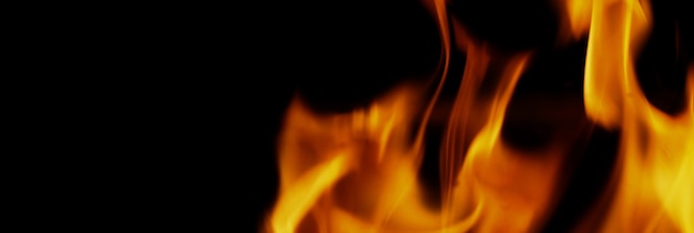 Fire background. abstract burning flame and black background.\
represents the power of burning refers to heat spicy seductive\
sensual or burning fuels. fire incidents burning destroys\
everything.