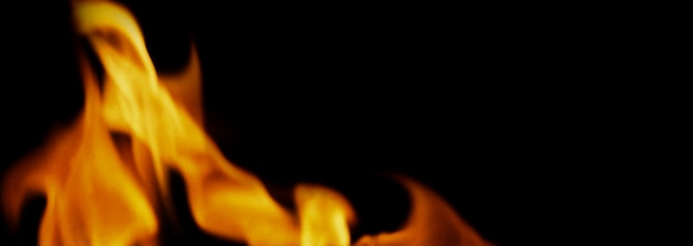 Fire background. abstract burning flame and black background.\
represents the power of burning refers to heat spicy seductive\
sensual or burning fuels. fire incidents burning destroys\
everything.