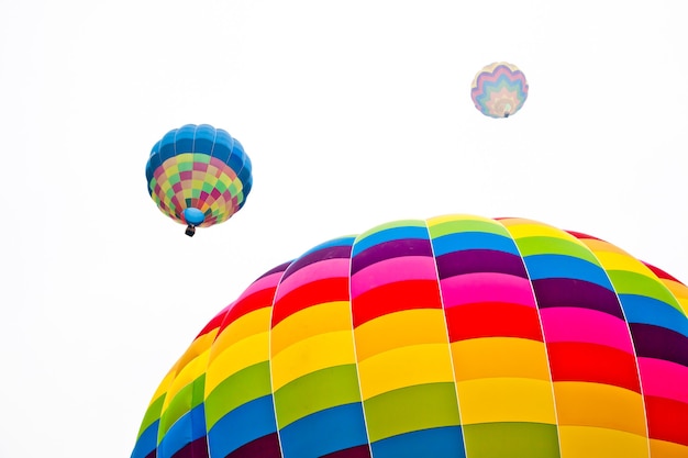 Fire balloon during a foggy day on white background