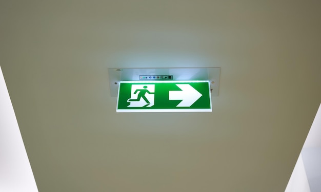 Fire exit sign with arrow