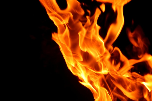 Фото Огонь пламя фон патер кадр на черном фоне