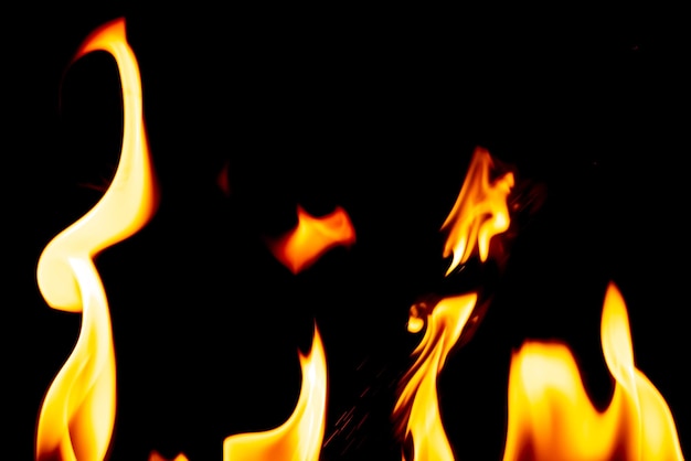 Photo fire flames burning on black background