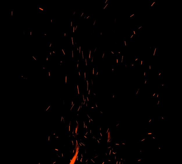Fire flames with sparks on a black background