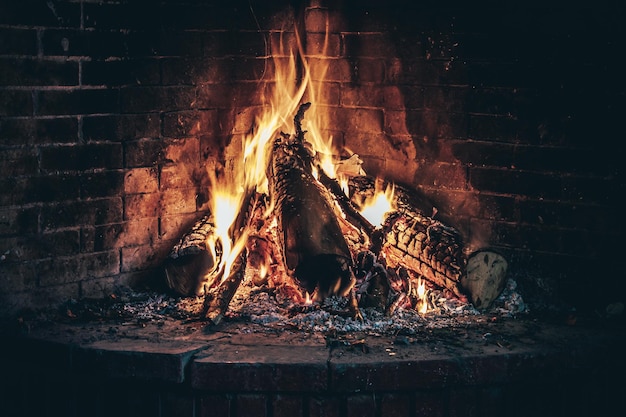 Fire lit from a fireplace at home