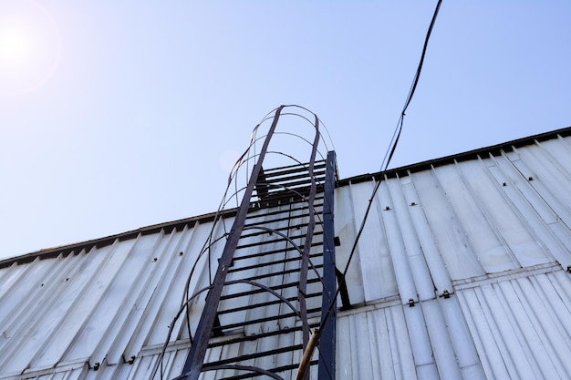 Fire metal staircase on a building wall