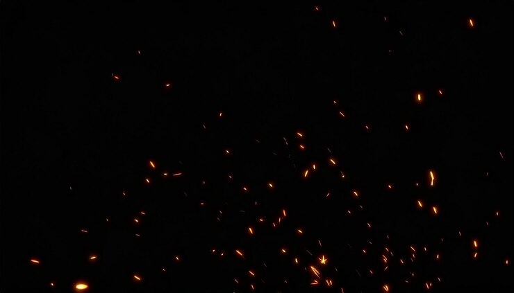 Photo fire sparks on a black background