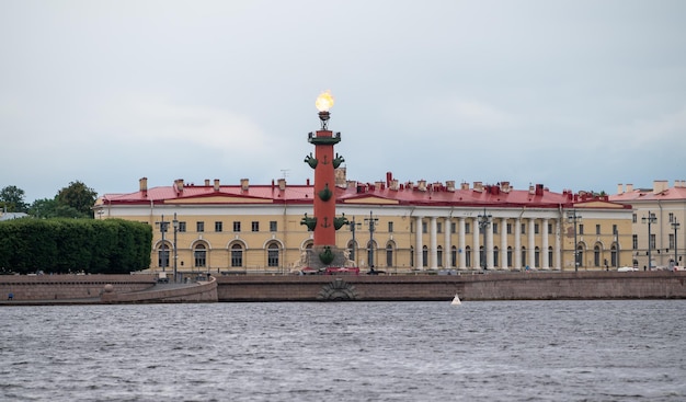 Fire at the top of the rostral column on the Exchange Square in St Petersburg