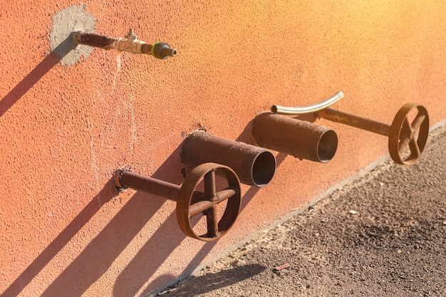 Fire water hydrant device and system on the wall. fire prevention and protection concept photo