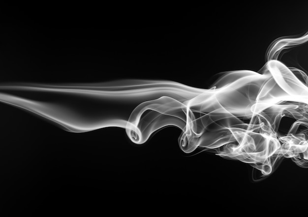 Fire of white smoke on black background. abstract movement