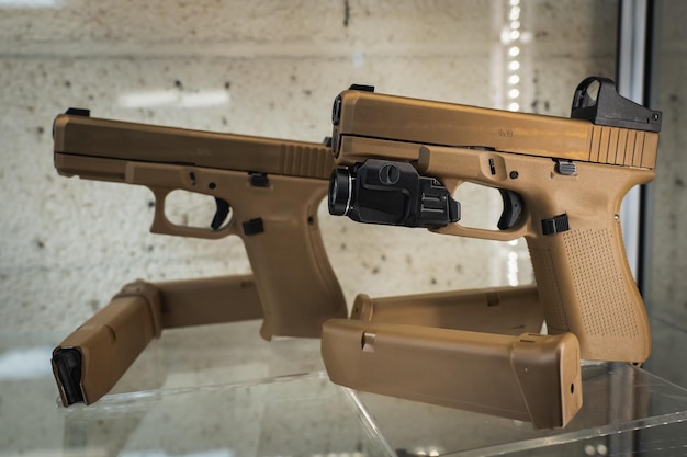 Photo firearms modern pistols g19x on display in a store closeup photo