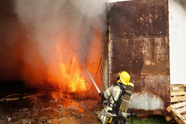 Firefighter putting out a fire