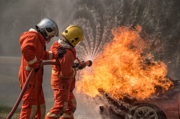 Firefighter splash water to fire hydrant