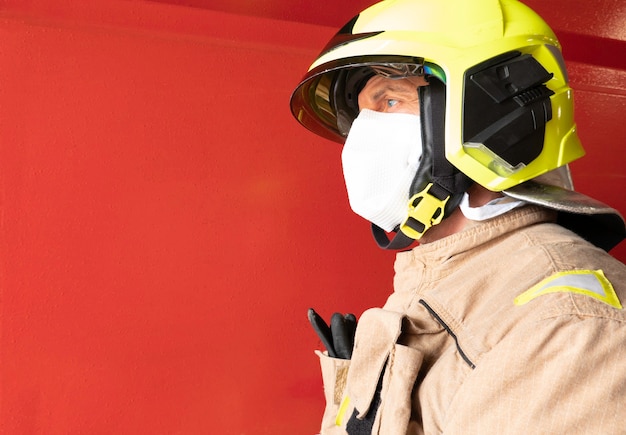 Firefighter with helmet and mask