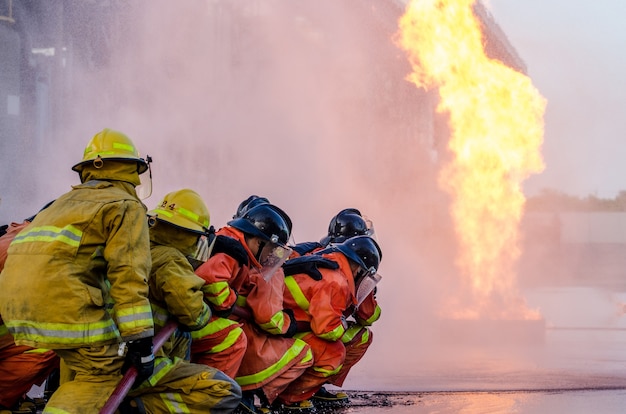 Photo firefighters training, training of firefighters, firefighting in the workplace