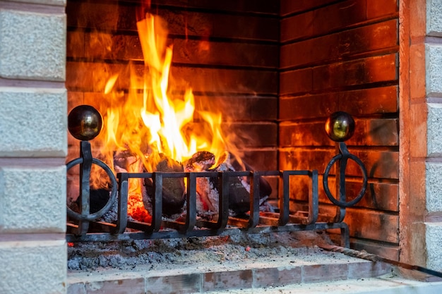 FIreplace wood is on fire in winter