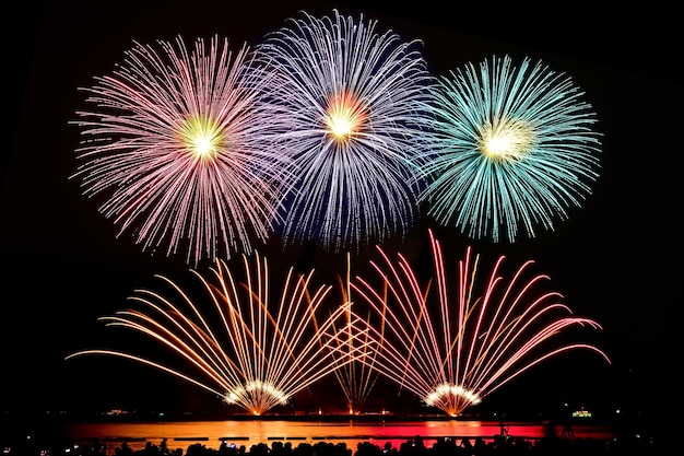 Firework celebration from the sea shore