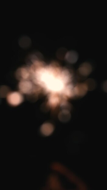 Photo firework at the night disfocused background