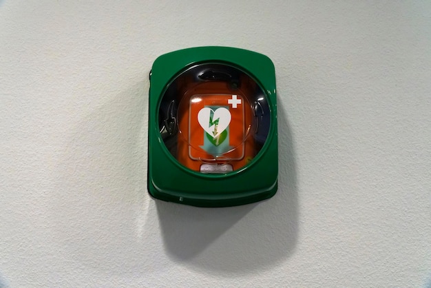 First aid cabinet on an office wall