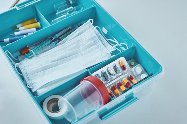 Photo first aid kit  close up. home medicine box with a medical items. healthcare and medicine concept.