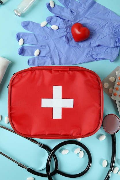 Photo first aid medical kit on blue