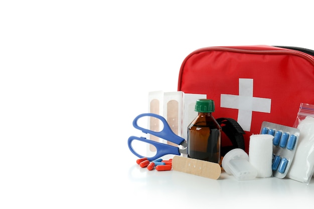 first aid medical kit isolated on white background