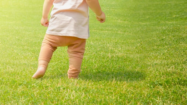 First baby steps Little baby learning to walk