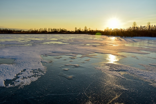 The first ice on the sun at sunset