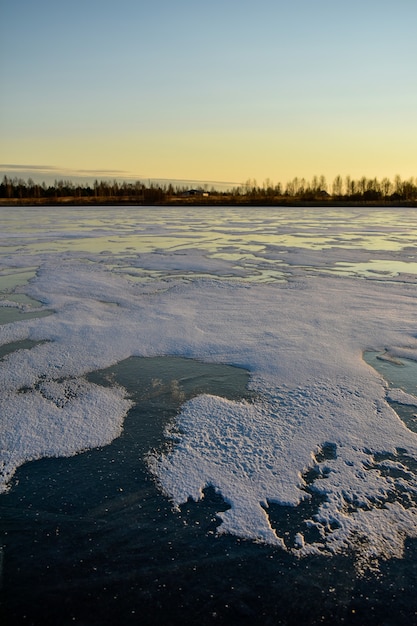 The first ice on the sun at sunset