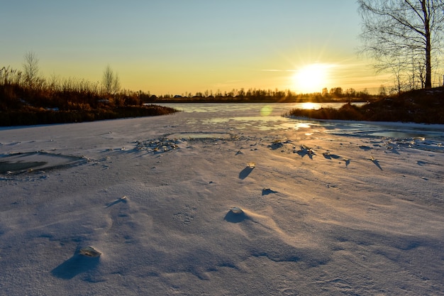 The first ice on the sun at sunset