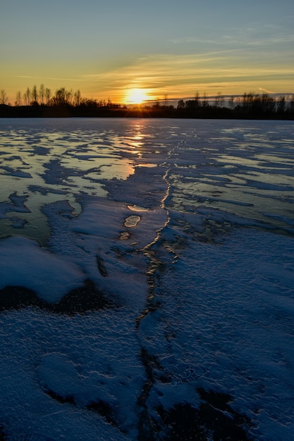 the first ice on the sun at sunset