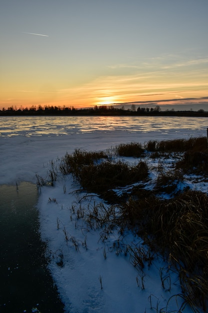 the first ice on the sun at sunset