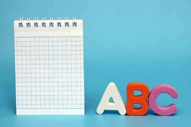 first letters of the English alphabet on a blue background