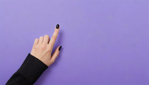 First person view hand with black nail polish shaping choosing sign with her index finger on purple