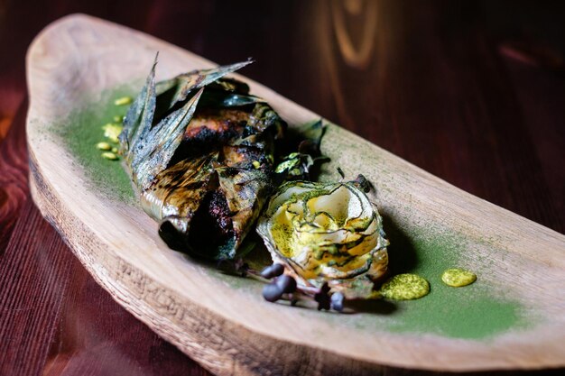 Fish baked in bamboo leaves Seafood dish