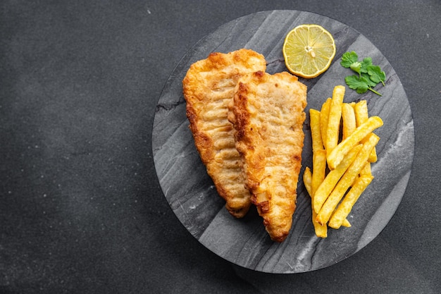 fish and chips french fries deep fried fast food takeaway healthy meal food snack on the table