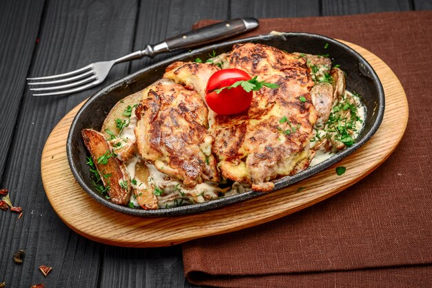 Fish dish - fried fish fillet with fried potatoes and vegetables