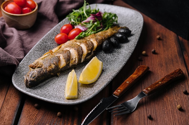 Fish dish roast trout and vegetables