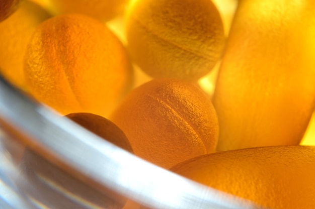 Fish oil capsules illuminated from below. close-up.