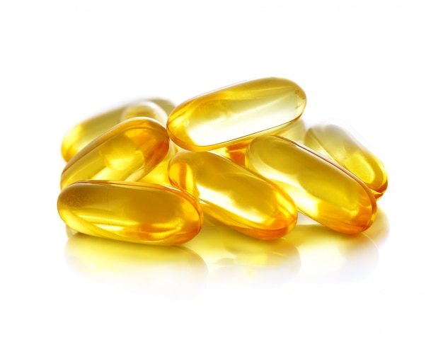 Fish oil capsules isolated on a white background