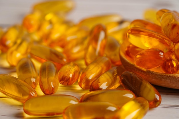 Fish oil or Cod liver oil gel in capsules with omega 3 vitamins supplementary healthy food