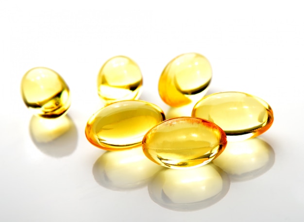 Fish oil pill on white