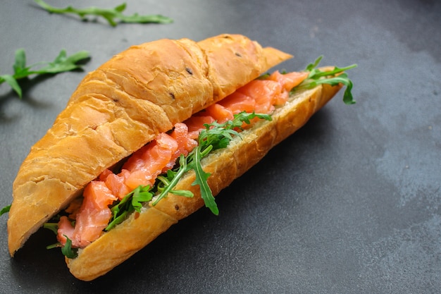 fish sandwich and greens