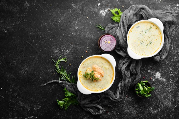 Fish soup with vegetables Soup in a bowl Top view Free space for your text