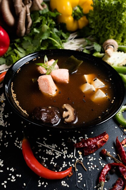 Fish tofu and mushroom soup in a bowl