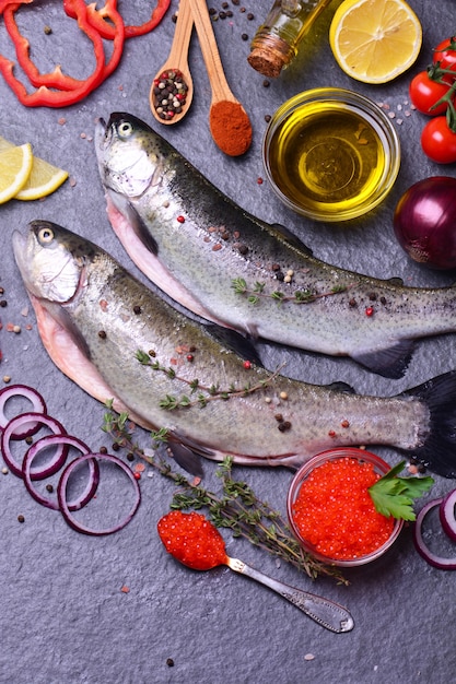 Fish trout with spices and lemon,red caviar