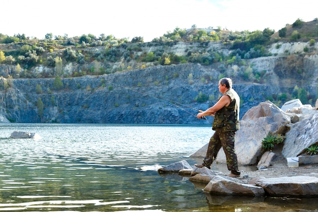 Fisherman on a mountain lake