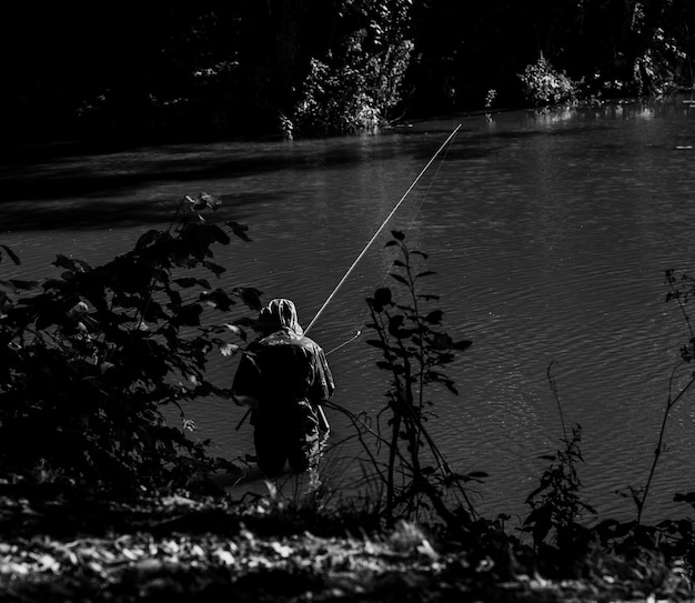 Photo fisherman with a fishing rod