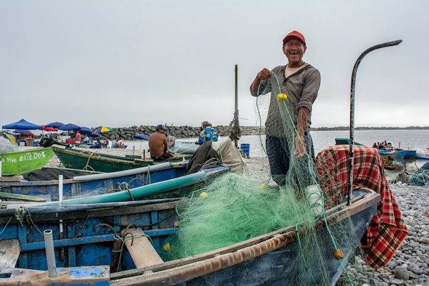 fisherman working in his boat